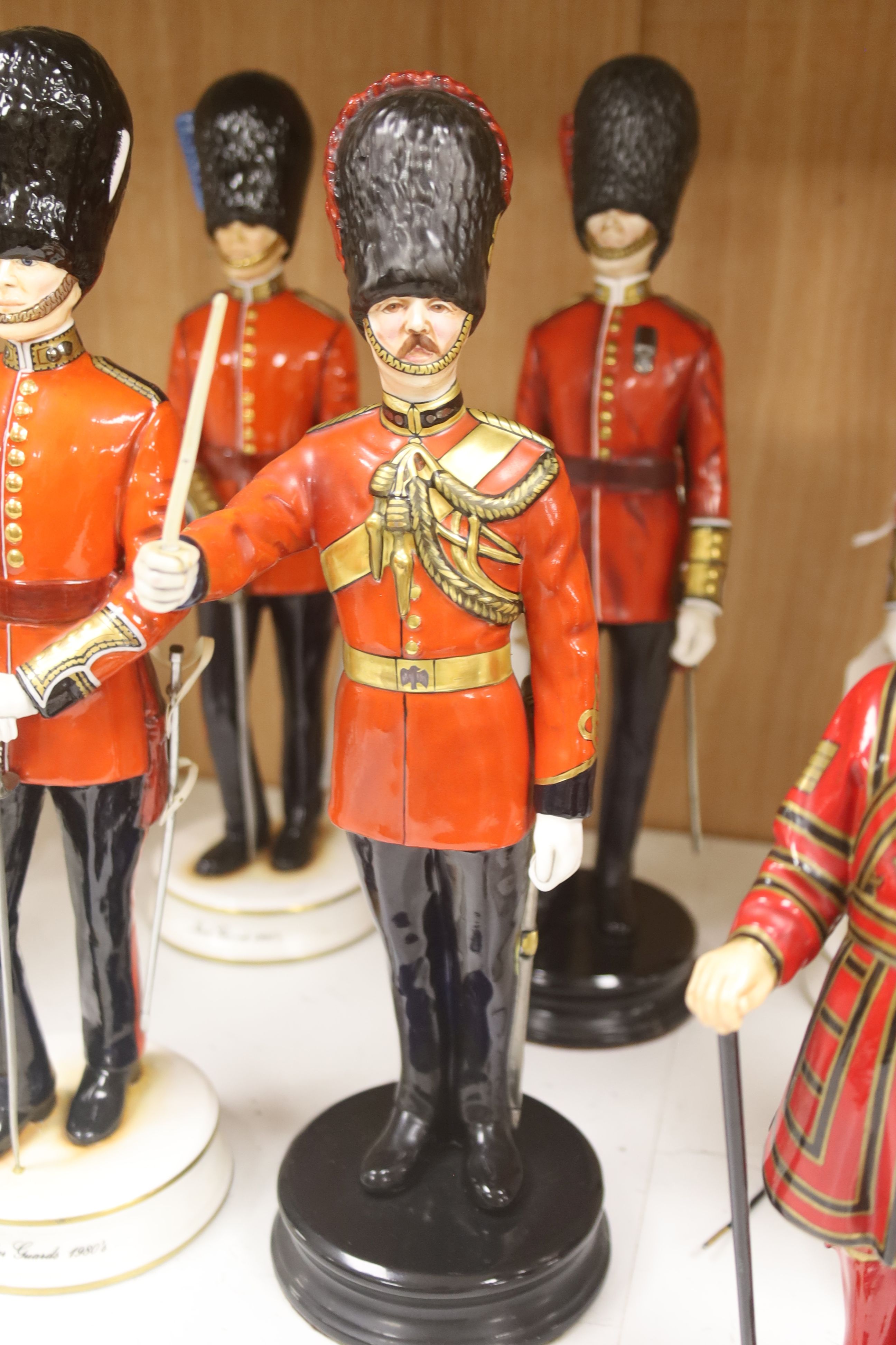 Eight limited edition ceramic figures by Michael Sutty, comprising 'Grenadier Guards 1980's', no. 221/250